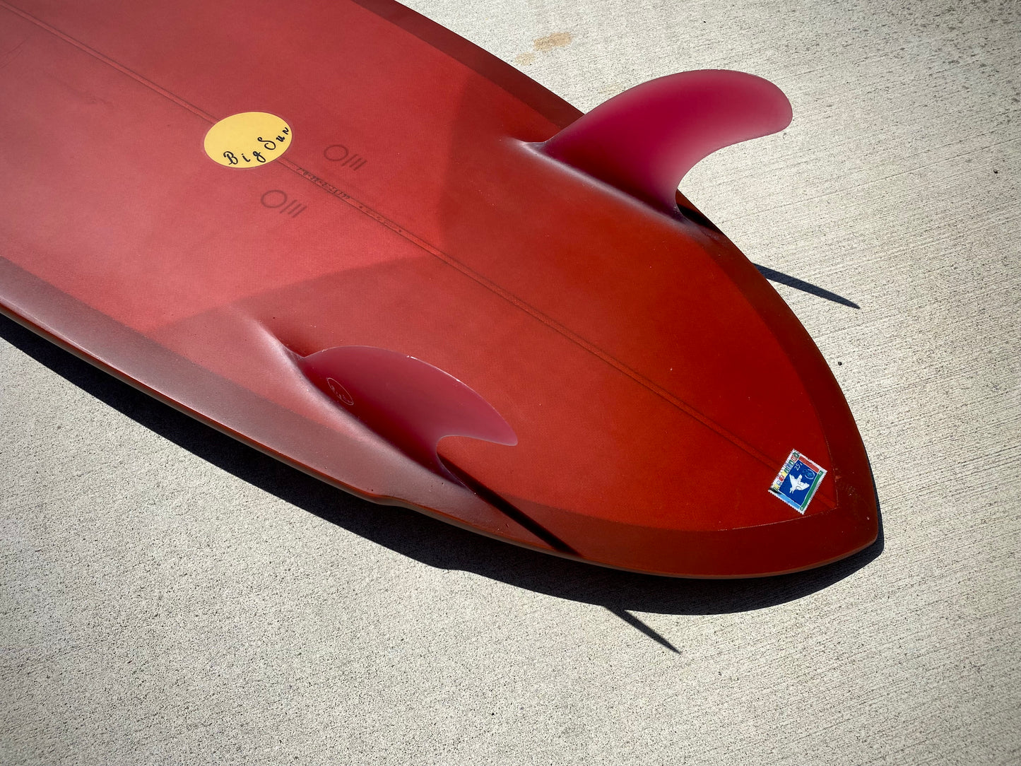 7'0 Twin Pin Midlength in Sun-Dried Red with Glass in 80's Twins