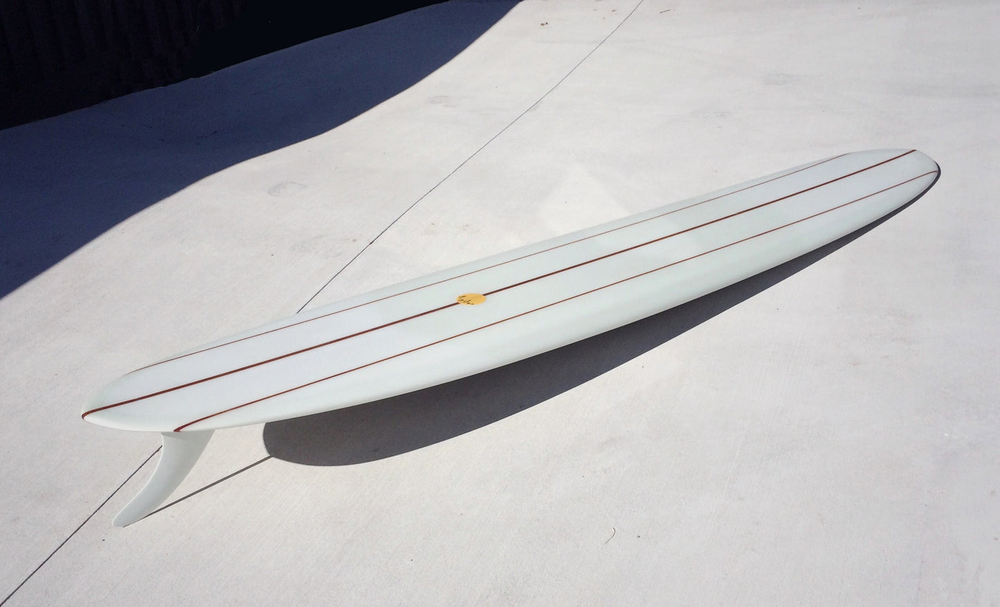 Used Big Log Pin Tail - 9'7 Triple Cedar Stringer with Glass in 10'5 Inch Logger